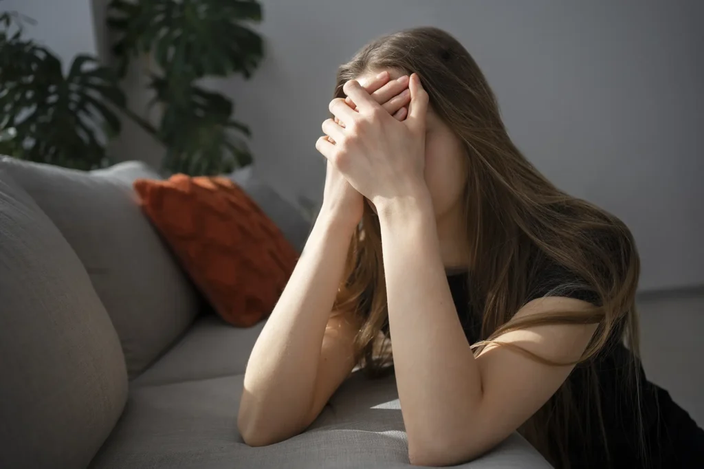 Infertility-sad-young-woman-home